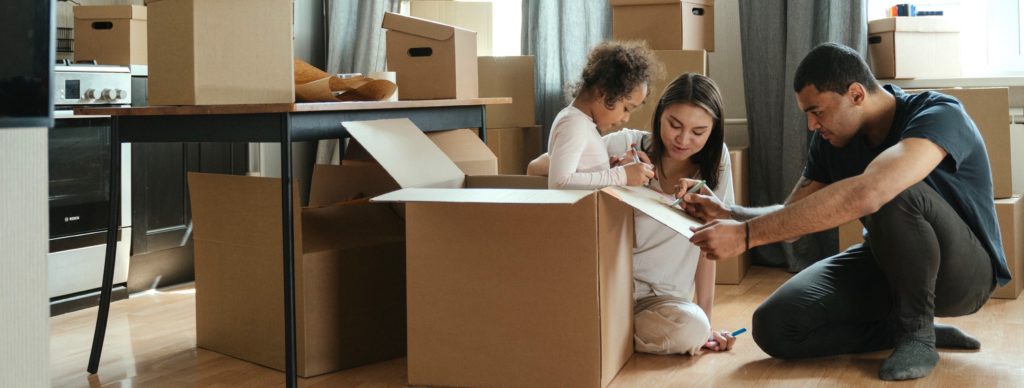 Family and packing boxes