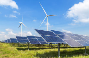 solar panels and wind turbines generating electricity in power s